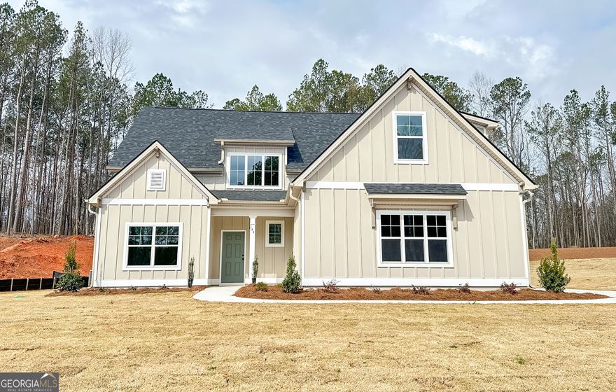 Crawford A - 4 Bedrooms and 4 Baths w/ Bonus Room. The 2-story foyer welcomes you into the Crawford Plan. The kitchen features a large island with an extended countertop and post legs. Appliances include a wall oven and microwave, smooth cook-top stove and a stainless steel chimney venthood. The kitchen also has Quartz countertops and large walk-in pantry. There's a large breakfast room with tons of natural light. It opens onto a covered back patio. The Primary Bedroom is on the main. It features a trey ceiling and large picture window on the back wall. Additional access to beautiful vaulted covered patio from Master Bedroom. The master bathroom has dual vanity, free-standing tub and a walk-in tile shower. There is a guest bedroom and full bath also on the main as well as the laundry room. Upstairs features two bedrooms (one with private bath), hall bath and a large bonus/media room. ***BUYER INCENTIVE: $25,000 to use towards closing costs, rate buy down, or price reduction, when working with a Preferred Lender and closing in 45 days.***