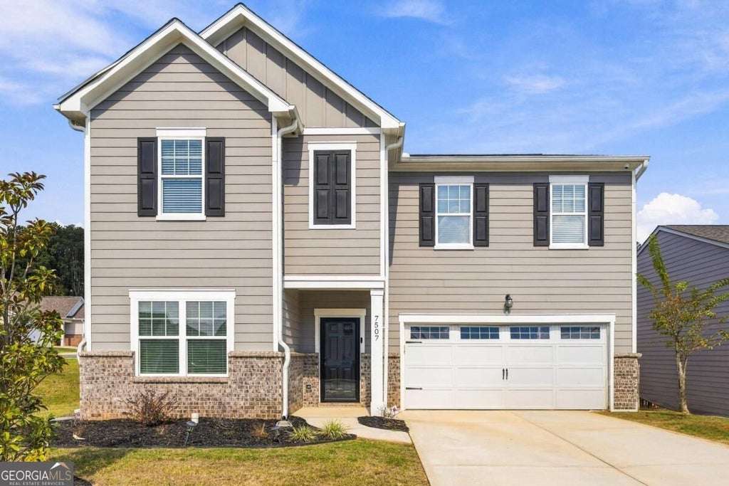 Photo of 7507 Saffron Avenue, Covington, GA 30014 (MLS # 10880732)