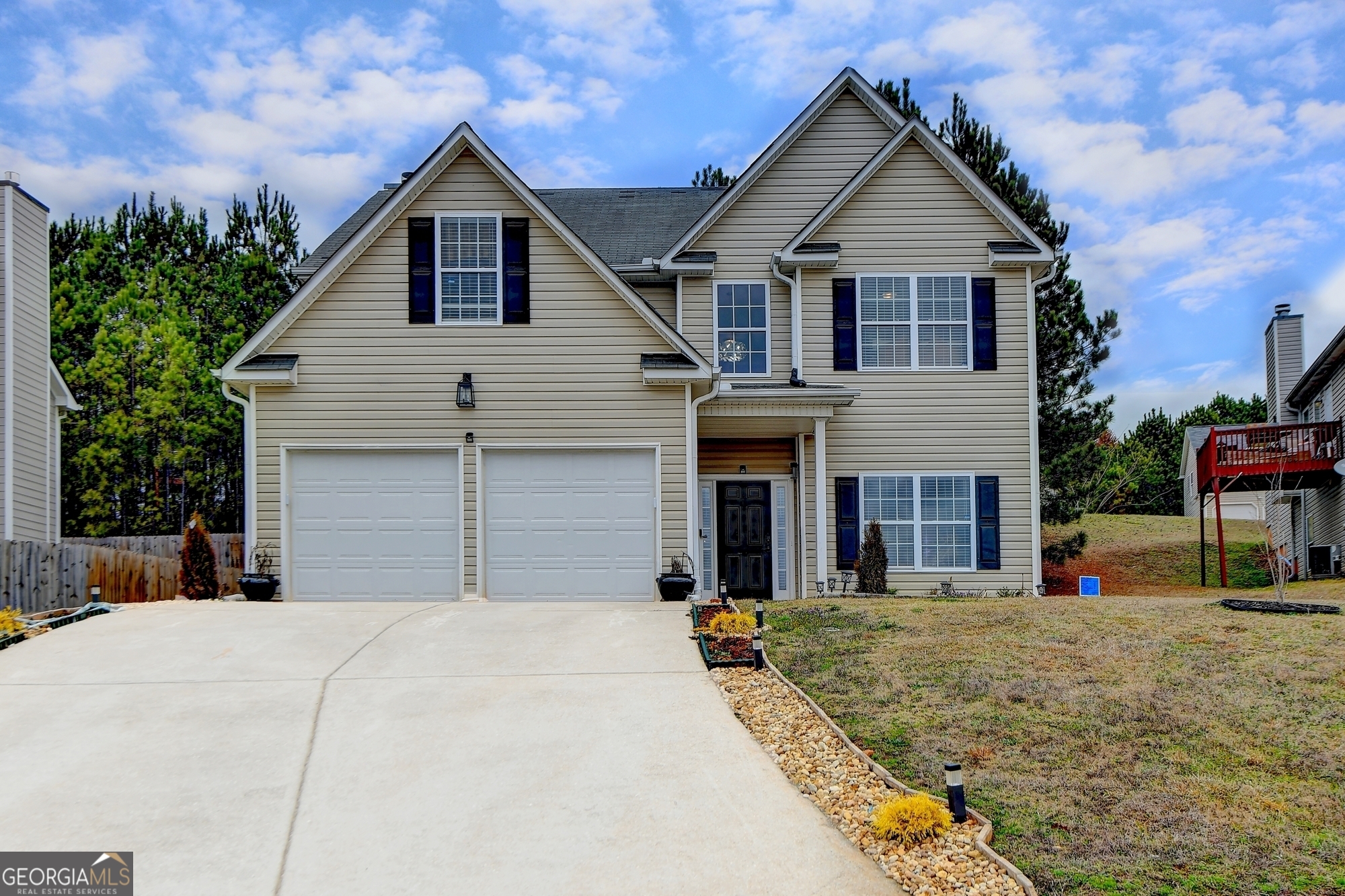 Completely renovated two-story home with 5 bedrooms and 3 full bathrooms in a quiet neighborhood. Home features a bedroom on the main floor as well as hardwood flooring throughout.