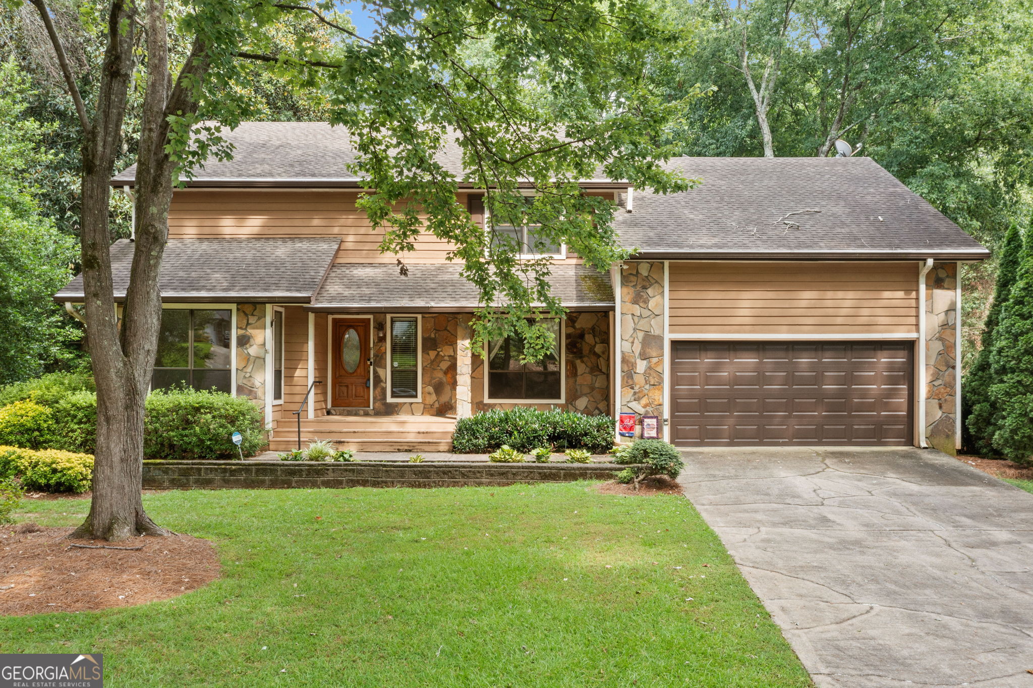 GOLF COURSE LOT WITH A POOL ON CHEROKEE HOLE 4! While this home is move-in ready, it also presents a fantastic opportunity for those eager to add their personal flair and modern updates. With solid bones and classic features throughout, you'll find the ideal canvas to create your dream haven. When you enter the home, you are greeted by a large living room and a separate dining room offering plenty of space for entertaining or relaxing. The highlight of the kitchen is the large 8 burner gas range with double ovens and vent hood. The kitchen offers easy access to the swimming pool. The kitchen flows seamlessly to the family room and there is a main level bedroom and full bathroom. Upstairs has 4 spacious bedrooms. The oversized primary bedroom features vaulted ceilings and provides a peaceful retreat. It is hard to find bedrooms as large as the 3 secondary bedrooms with ample closet space. There are 2 large walk-in closets that may provide the opportunity to add a third full bathroom on the upper level. Enjoy sweeping golf course views from the screened in porch and deck overlooking the swimming pool. There is plenty of space to entertain indoors and outdoors in the backyard oasis. Perfect for those seeking both value and location, this property invites you to reimagine, renovate, and truly make it your own.