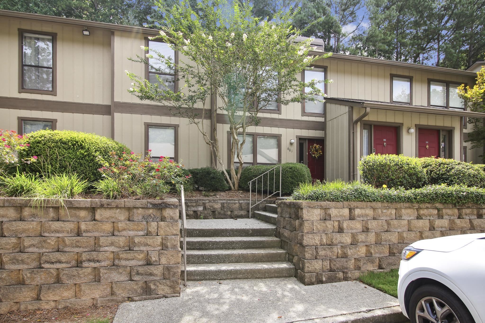 No steps into this one-level condominium. Open floorplan with private backyard and patio. Spacious sunroom which is unique in this neighborhood. Easy access to schools, dining, transportation and places of worship. Wooded setting with swim and tennis facilities for you and your guests. Easy drive to GA 400 and Roswell Road. Convenient to the Perimeter and office buildings on the north side.