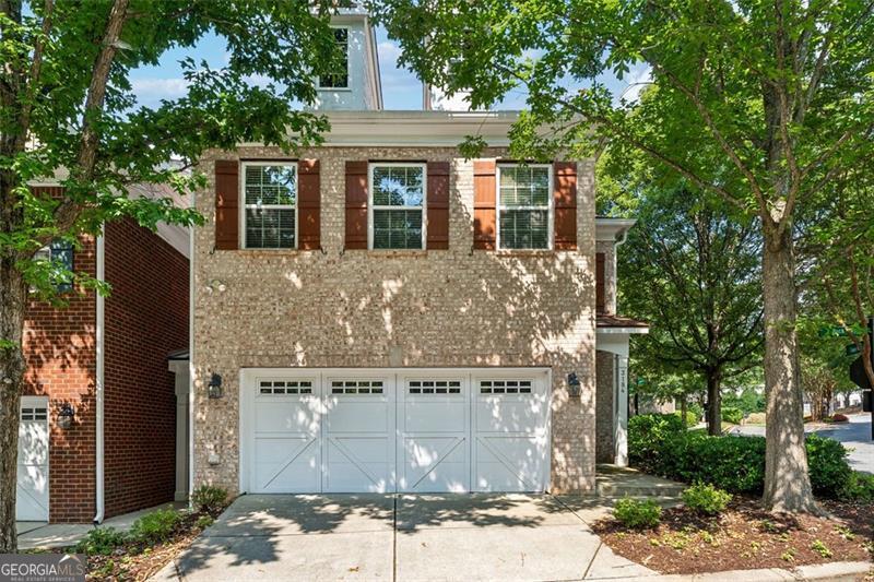 Elegant End-Unit Townhome in Prime Alpharetta Location-Minutes from Avalon. Welcome to 3184 Buck Way-a beautifully maintained, all-brick end-unit townhome nestled on a corner lot in the heart of Alpharetta. Originally the model home for the community, this residence boasts 3 spacious bedrooms, 3 full bathrooms, and over 2,200 square feet of thoughtfully upgraded living space. Gleaming hardwood floors and custom lighting throughout Renovated bathrooms featuring frameless glass showers, vessel sinks, and designer tile. Gourmet kitchen with granite countertops, stone backsplash, wine/beverage fridge, and included refrigerator. Versatile dining room with stylish barn doors-ideal for a guest room or home office. Expansive master suite with walk-in California closet and barn door accent. Private patio with lush landscaping for serene relaxation * Access to community pool and tranquil lake. HOA includes exterior maintenance, lawn care, water, trash, and pest control-worry-free living at its finest. Minutes from Avalon, Costco, top-rated schools, and a vibrant mix of shopping and dining options. This home offers the perfect blend of luxury, convenience, and value in one of Alpharetta's most desirable neighborhoods.