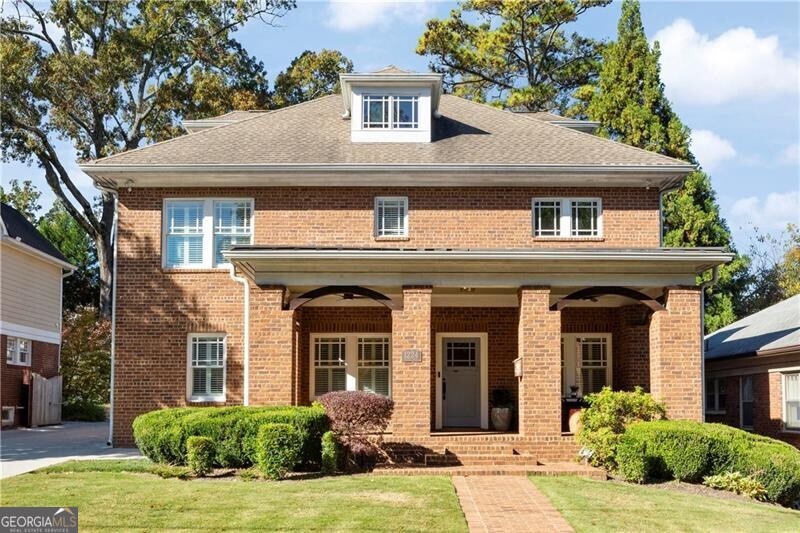 Nestled in sought after Morningside, this recently renovated and expanded 5 bedroom residence is a celebration of character and charm w/ today's finish level. Features include hardwood floors throughout, an ideal floor plan for entertaining, arched doorways, high ceilings. The gorgeous eat-in kitchen has quartz counters, custom white cabinetry, Wolf range, stainless appliances, and opens to living room. French doors off of living area lead to a paver patio and flat walk out back yard. 2 secondary bedrooms on the main level along w/ a sunroom and dining room and cute sitting room with book shelves, fireplace. Primary suite with new marble bath, herringbone tiled floors, soaking tub/ shower. Large laundry room upstairs by primary. All bathrooms have been newly renovated. The 3rd floor serves as a flexible living area, perfectly suited for a living area and gym or office. Rare 2 car detached garage offers convenience and extra storage. Four sided brick exterior with welcoming, oversized covered front porch with arched brick casings. Seconds to restaurants, shopping, parks, top rated Morningside school district. It's more than just a home; it's a lifestyle opportunity not to be missed!