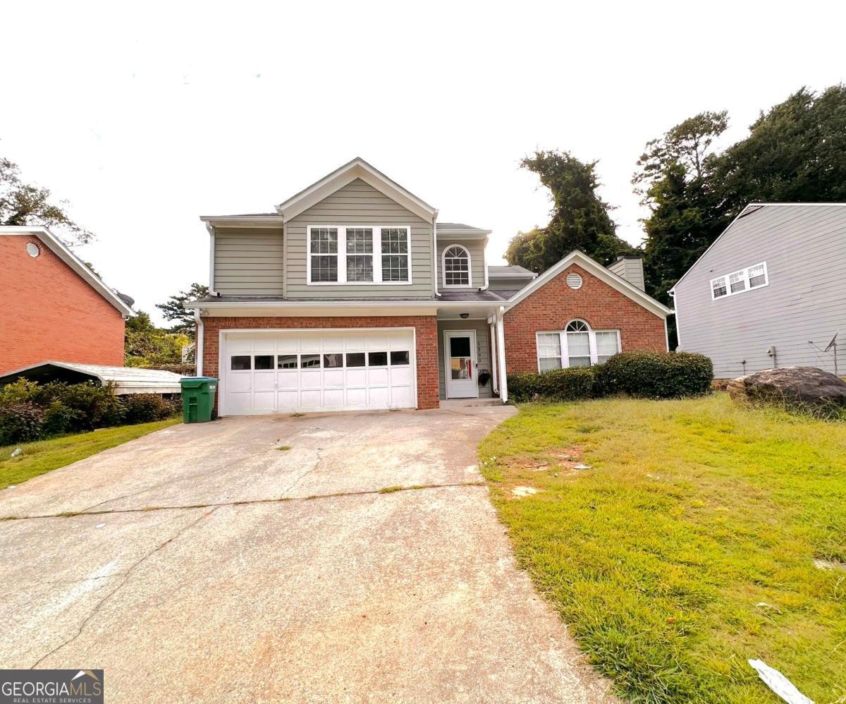 A well-maintained, 3beds/2 and a half baths home in a well-established neighborhood waiting for a new owner. This brick front, beautifully designed home opens to two story foyer and living room with vaulted ceiling and cozy fireplace. Wood stair takes you to upstair with a huge bedroom with vaulted ceiling, a large bathroom with separate soaking tub and shower and walk-in closet. A full bathroom with tub/shower combo separates two additional, decently sized bedrooms. On the main level, open concept dining area and bonus computer/play room overlook living room. Kitchen offers stone counters, gas range with electric venthood. Back exterior door from kitchen opensto a covered back patio along with play and entertainment area in the privacy of a fenced back yard.