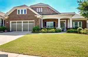 HUGE PRICE IMPROVEMENT, SELLER SAYS ALL OFFERS WILL BE CONSIDERED! SELLERS LOSS IS YOUR GAIN! Welcome to 232 Begonia Court-an elegant and spacious home located in the highly sought-after Sun City Peachtree, a gated active adult community with 24/7 security guard. This meticulously maintained 3-bedroom, 3.5-bath home offers nearly 3,000 square feet of refined living space. The open-concept floor plan features a large great room with abundant natural light, a gourmet kitchen with upgraded appliances and stone countertops, and a bright breakfast area that opens to a sunroom with ceramic tile flooring-perfect for entertaining or relaxing. The oversized primary suite boasts a spa-like en-suite bath with double vanities, a soaking tub, separate shower, and a generous walk-in closet. Each guest bedroom includes its own private full bath, providing comfort and privacy for family or visitors. Additional highlights include: Hardwood floors throughout main living areas Separate formal dining room Dedicated office/flex space Extended garage with storage options Professionally landscaped yard Enjoy world-class amenities including a clubhouse, indoor/outdoor pools, fitness center, tennis and pickleball courts, golf course, walking trails, and a full calendar of community events. Don't miss this rare opportunity to live in one of Georgia's premier 55+ communities!