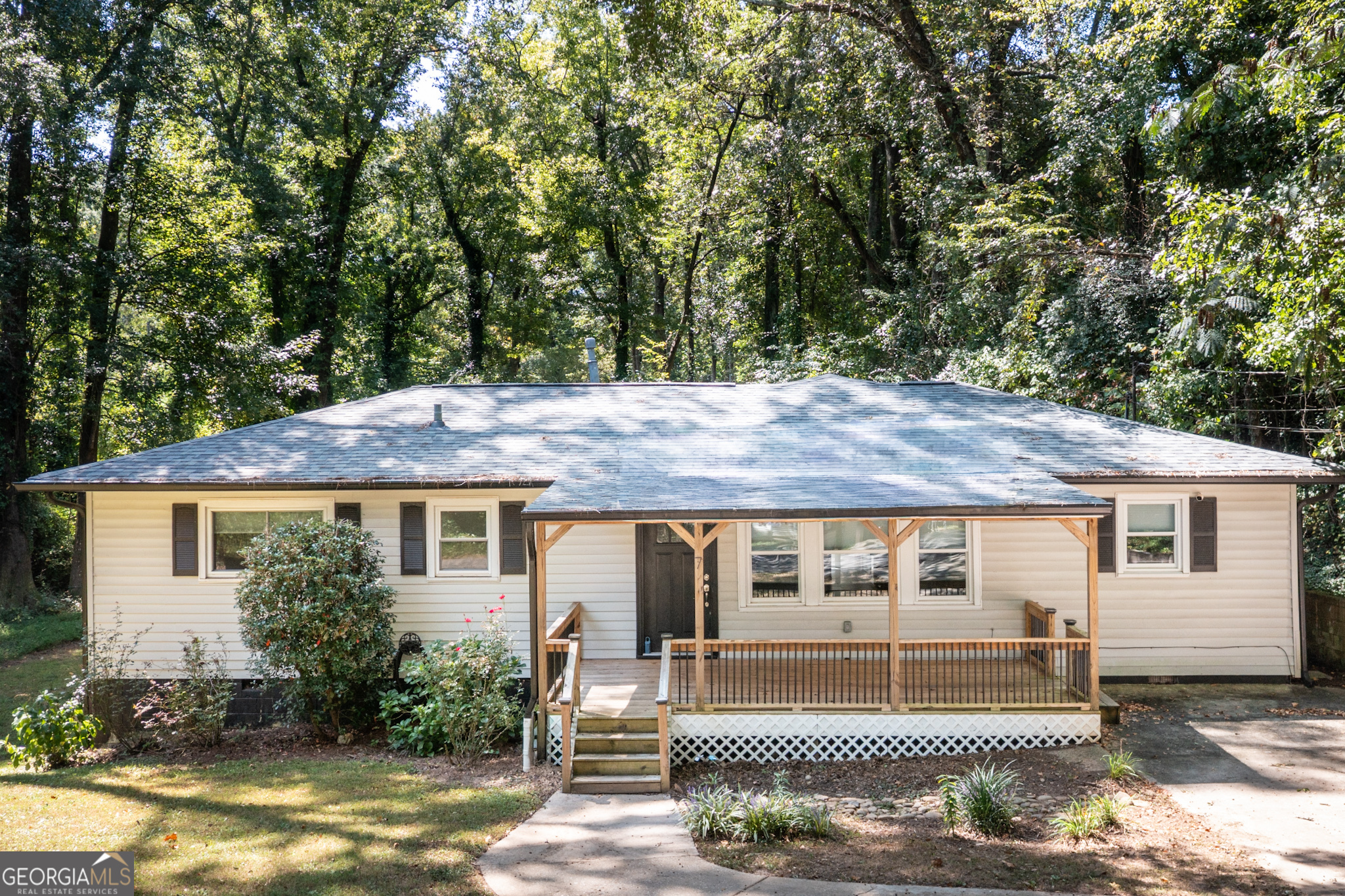 ARE you looking for a beautifully renovated RANCH home in a great location? Then take a look at this 3 Bedroom 2 Bathroom home with 1,838 sq. feet of awesomeness! It is within walking distance to Elm Street School. Enter the covered front porch which leads into the Family Room with refinished hardwood flooring. This is all open to the bright Dining area and Kitchen which features granite counters, stainless steel appliances and an amazing refrigerator, prep island and a breakfast area overlooking the deck and back yard. There is ample storage with a sizable Pantry and a separate Laundry Closet. The Primary Suite is in one wing of the home and showcases the Bedroom and an amazing large bathroom with double vanities, stand-alone soaking tub, separate shower, storage and a cedar lined storage closet! There are additional Bedrooms and a secondary renovated full Bathroom with double sinks. One area can be used as an office with an electric fireplace, bonus room, den, etc. There is a deck off the kitchen area and an Outbuilding/Shed for additional storage use as well! You don't want to wait too long to see this home! Get ready to move into your new home well before the Holidays!