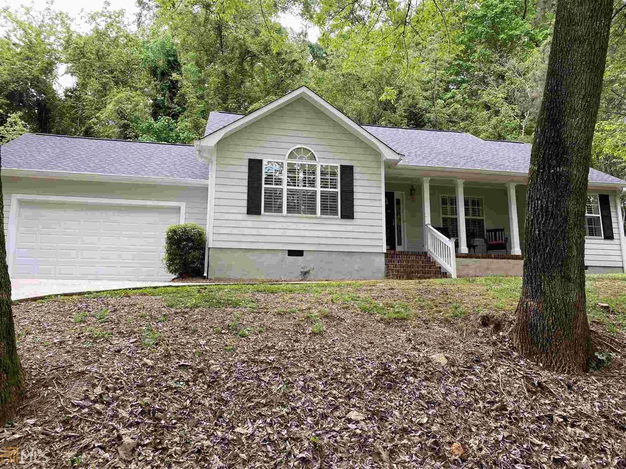 LOVELY TREASURE IN OLD EAST ROME!! SIT ON YOUR FRONT PORCH, DRINK YOUR COFFEE AND ENJOY GOD'S HANDIWORK. GORGEOUS SEASONAL VIEW!! THIS LOVELY 3 BR,2 BA HOME FEATURES GREATROOM WITH CATHEDRAL CEILING AND FIREPLACE, HARDWOOD FLOORS, FORMAL DINING ROOM, AMAZING SCREENED IN PORCH AND VERY PRIVATE YARD.