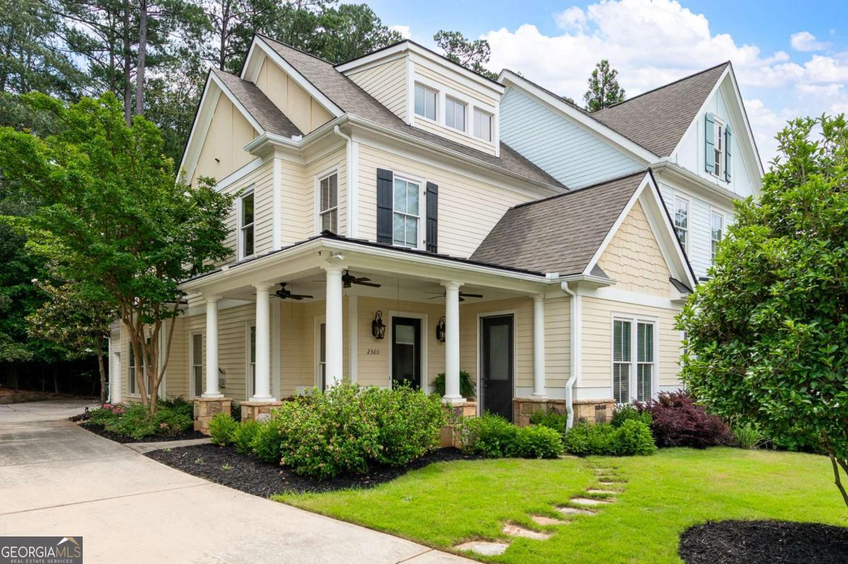 Discover this stunning 2,700+ sq. ft. craftsman-style townhome that lives like a single-family home - tucked in the quiet, beautifully maintained, Whispering Lake neighborhood, just minutes (half a mile) from vibrant Downtown Kennesaw. With charm, space, and upgrades throughout, this home is anything but ordinary. Step inside to find a spacious open-concept main level featuring a large family room with an electric gas-log fireplace, beautiful main level home office, chef's kitchen with a large granite island, stainless steel appliances, custom wood cabinetry & backsplash, spacious dining area & large laundry room with sink. Lots of storage & a large walk-in closet under the stairs. Upstairs, the oversized primary suite includes a luxurious tiled ensuite bath and a large walk-in closet. Two generously sized secondary bedrooms share a Jack & Jill bathroom, and a built-in desk in the hallway offers a great homework or work-from-home spot. All bedrooms feature oversized walk-in closets for maximum storage. Long, private driveway, a two-car garage, plus extra guest parking nearby. Beautiful landscaping. The covered stone Patio is the perfect spot for grilling & relaxing. This smart home is equipped with an Amazon wall screen, upgraded Nest thermostats, keyless door entry & modern tech touches throughout. Small, tranquil neighborhood with walking trails and a scenic pond, yet walkable to all the dining, shops, and events in Downtown Kennesaw - this home offers the perfect blend of convenience and tranquility. Compare the square footage & finishes of other homes for sale in the area to appreciate the exceptional value this beautiful craftsman home offers. GORGEOUS & MOVE-IN READY! A TRUE MUST-SEE!
