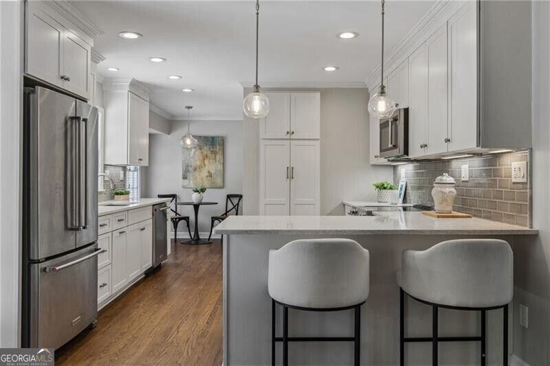 Photo of 1424 Cedarhurst Drive, Dunwoody, GA 30338 (MLS # 10877455)