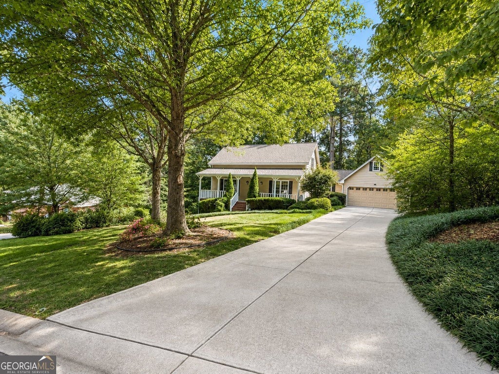 Photo of 1052 Evelyn Lane, Lilburn, GA 30047 (MLS # 10848487)