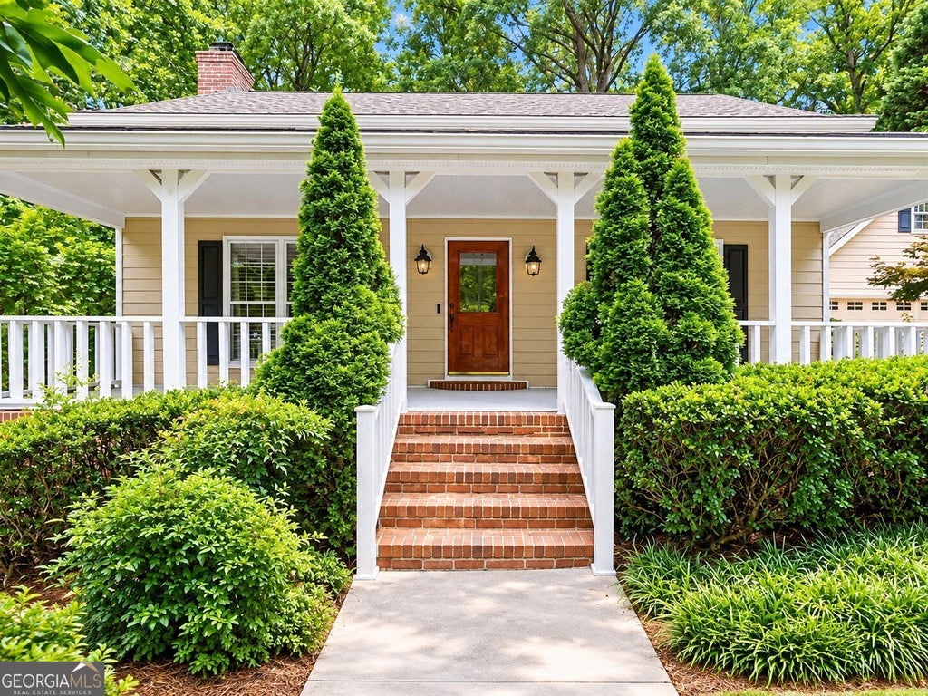 Photo of 1052 Evelyn Lane, Lilburn, GA 30047 (MLS # 10848487)