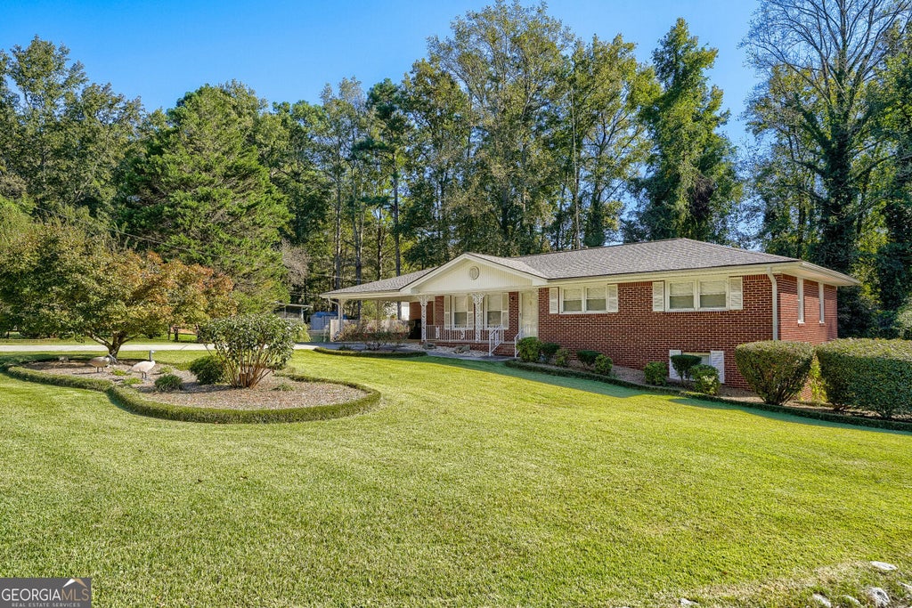 Photo of 3840 Yates Drive, Lithia Springs, GA 30122 (MLS # 10876076)
