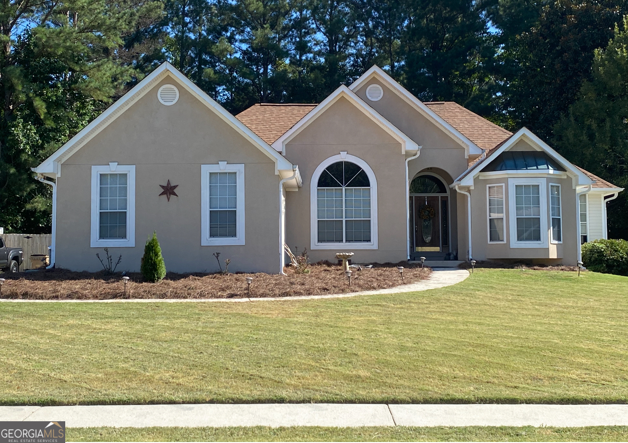 Beautiful Stucco Ranch 3 Bedroom 2 Full Bath Open Floor Plan - Split BedroomPlan - Vaulted Ceilings - Huge Master Suite - Totally Renovated Master Bath - LVP Flooring - 2 Car Garage - Screened Porch with Private Backyard and Above Ground Pool & Deck.