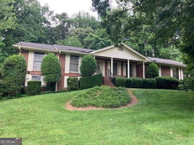 Nestled on a picturesque wooded lot, this inviting three bedroom, two and half bath home offers the perfect blend of comfort, privacy and outdoor living. Living room opens to separate dining room. Eat-in kitchen overlooks the scenic backyard. The finished basement provides additional living space with game room, two offices, half bath and workshop. Ready for your personal touches.