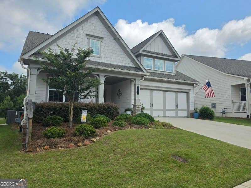 Photo of 214 Hickory Bluffs Parkway, Canton, GA 30114 (MLS # 10801725)