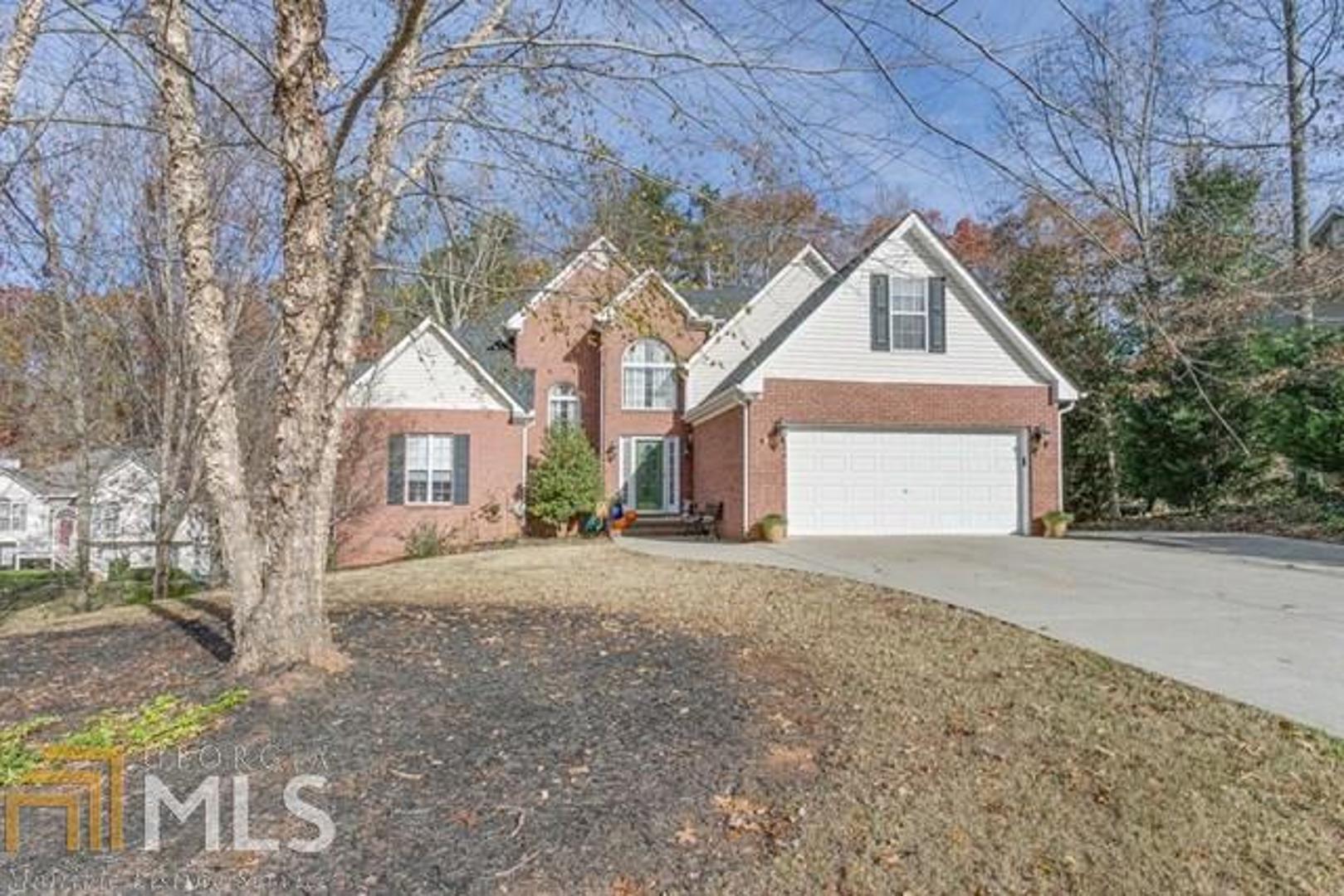 Very charming home is one of the largest in this neighborhood and is in excellent move in condition. Features include open space,beautiful hardwood floors, high ceilings,SS appliances, insulated windows and a large master bedroom on main level. Now the full finished terrace level complete with full kitchen, living area and bedroom. Perfect for a mother-in-law or teen suite with it's own separate attached garage which takes you straight into the living area. In fact if you wanted you could even use as a rental apartment. Big private wooded flat back yard. Must see.