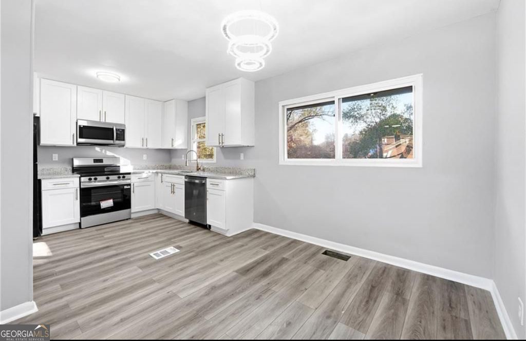 Photo of 1376 Colony East Circle, Stone Mountain, GA 30083 (MLS # 10657685)