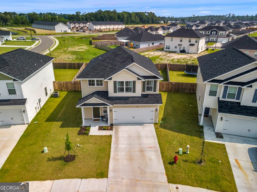 Welcome home to modern comfort and unbeatable convenience! Located just minutes from Fort Stewart and shopping, 15 minutes to I-95, and only 45 minutes to Savannah, this stunning patio home offers the best of both worlds-peaceful living and quick access to everything you need. Step inside to find a bright, airy layout with LVP flooring, neutral tones, and an impressive two-story foyer that sets the tone for this stylish, open-concept home. The kitchen flows seamlessly into the dining and family room, making entertaining a breeze. Upstairs, you'll find two spacious secondary bedrooms, a full bath, and a luxurious primary suite featuring vaulted ceilings, a large walk-in closet, and a spa-like bath with soaking tub and separate shower-a perfect retreat after a long day. Enjoy outdoor living in the private backyard-ideal for relaxing or hosting guests.This is a great chance to get a move in turnkey ready home!