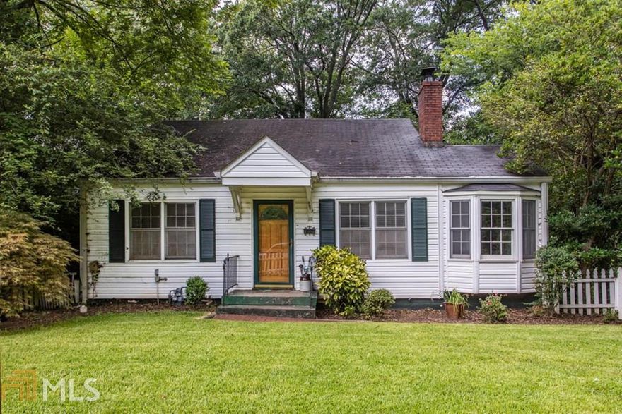 Super cute cottage in the heart of East Atlanta Village. On sought after Brownwood Ave, this sweet 2 bedroom + 1 bathroom has loads of curb appeal and boasts hardwood floors and light throughout. The home has a living room, separate dining room, kitchen, plus a bonus room that can be used as an office! House also has a screened porch, a large unfinished basement and spacious front and back yard, along with a detached garage. Needs a special buyer's TLC or great for an investor to flip and sell! Home is SOLD AS-IS.