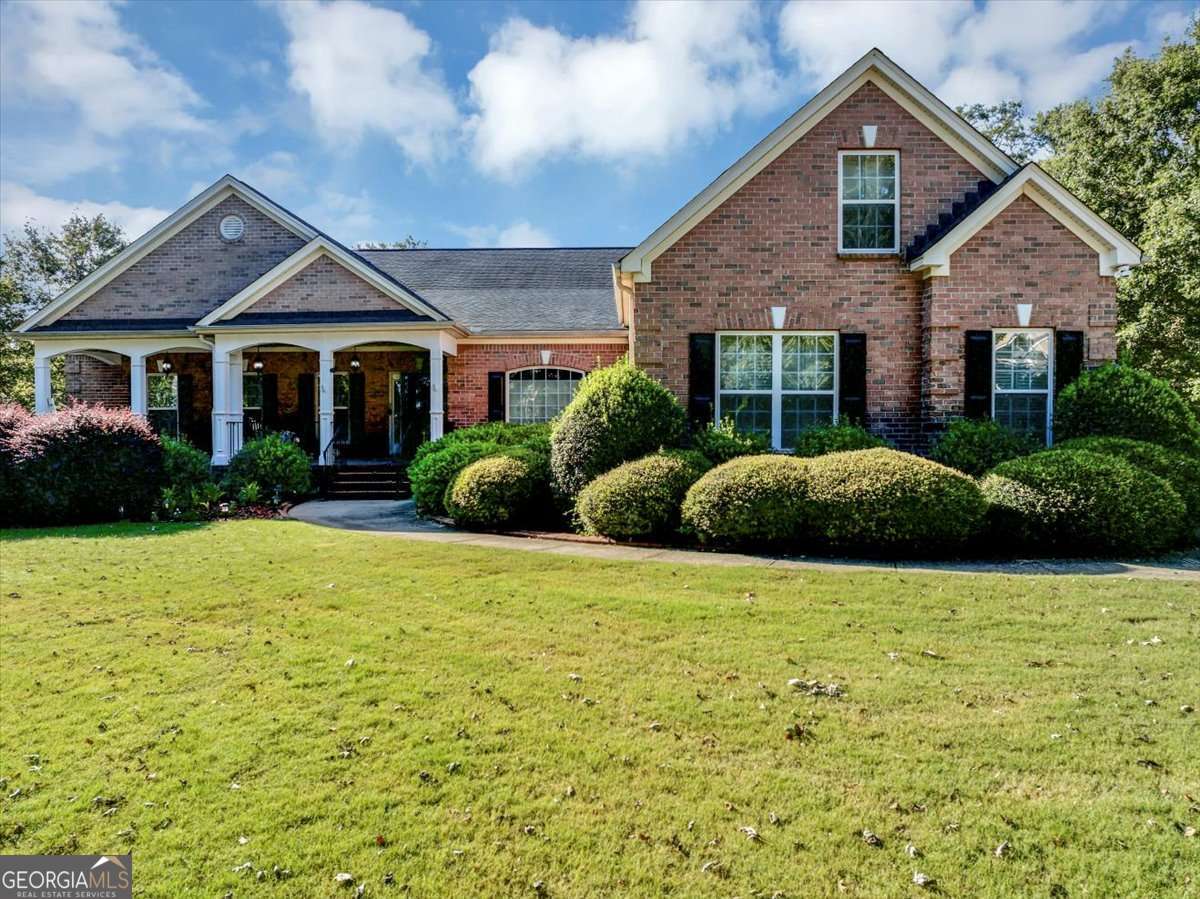 Beautiful 4-sided brick ranch home located on a cul-de-sac in Emerald Falls. The main floor features a formal living room, a den, and a spacious kitchen with a view of the family room and a breakfast area. The large master suite includes a sitting room, a generously sized bathroom with dual sinks, a large jetted tub, a tiled stand-up shower with a glass door, a walk-in linen closet, and a large walk-in closet. Additionally, there is a bonus room with a closet. The fully finished basement boasts an exercise room, a media room, and an entertainment room with a fireplace and wet bar, along with a pool table area. It also includes a kitchen and eat-in area, two bedrooms, a bathroom, a storage room, and a tools/storage room with a boat door. Outside, enjoy quiet mornings on the front porch with a coffee or the screened in back porch with an evening cocktail overlooking the expansive and private backyard.