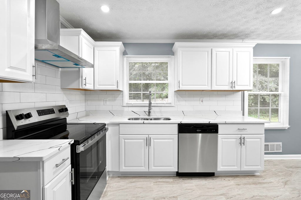 Photo of 46 Stone Wood Lane, Lawrenceville, GA 30046 (MLS # 10783646)