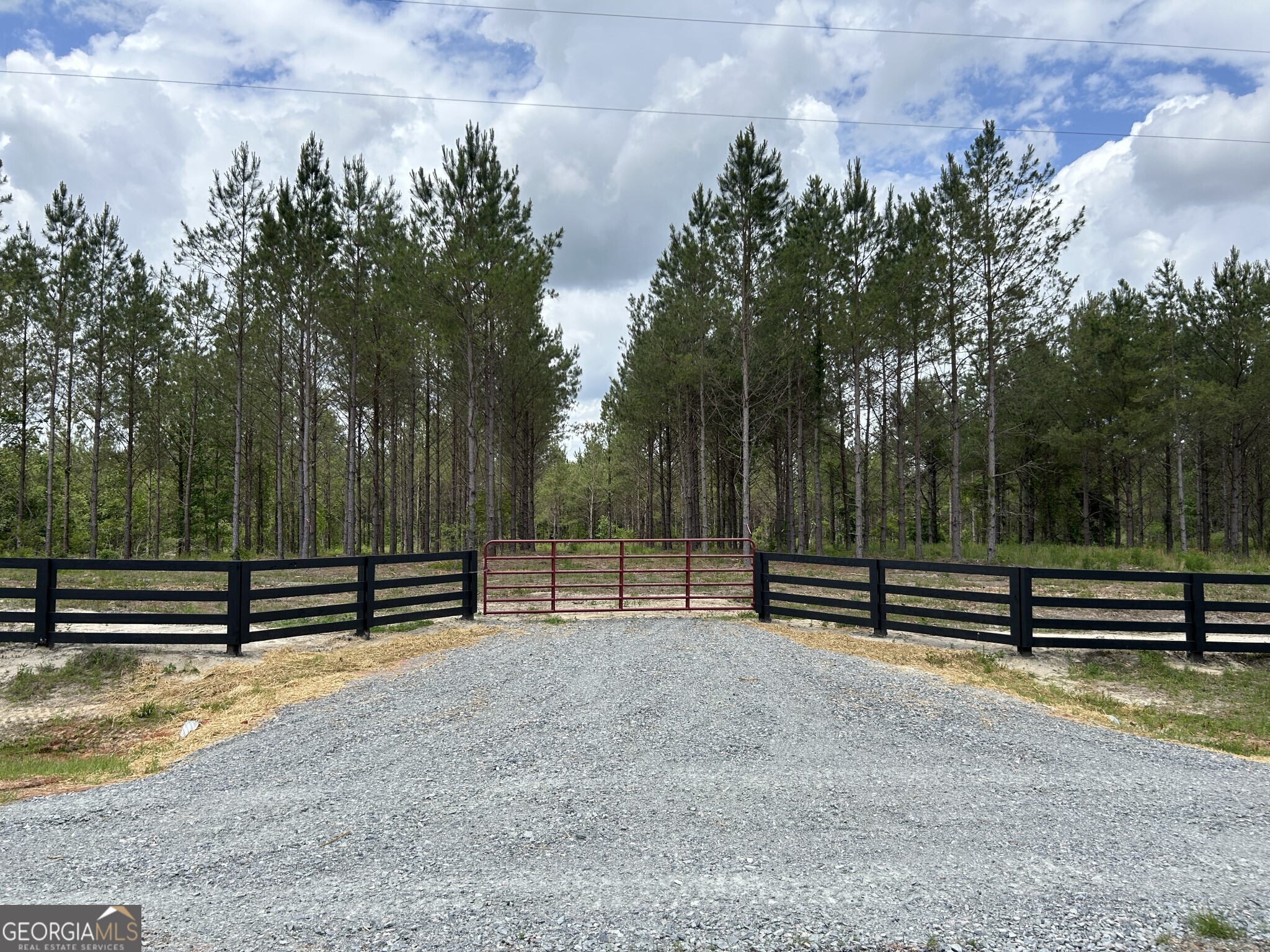 Bluewater is home to 19 beautiful country homesites, perfect for those seeking peace, privacy, and a slower pace of life. Lot #5 offers 5.409 wooded acres with a small creek along the back property line, providing a scenic and tranquil setting where nature abounds. This gated community features protective covenants, paved road frontage, and access to an excellent public school district. Ideally located just minutes from charming downtown Dublin and only 6 minutes from Interstate 16, Bluewater sits halfway between Atlanta and Savannah, making it convenient to shopping, dining, and entertainment. With a thriving local economy and plenty of small-town charm, this is a wonderful place to build your dream home, raise a family, and enjoy the laidback country lifestyle.