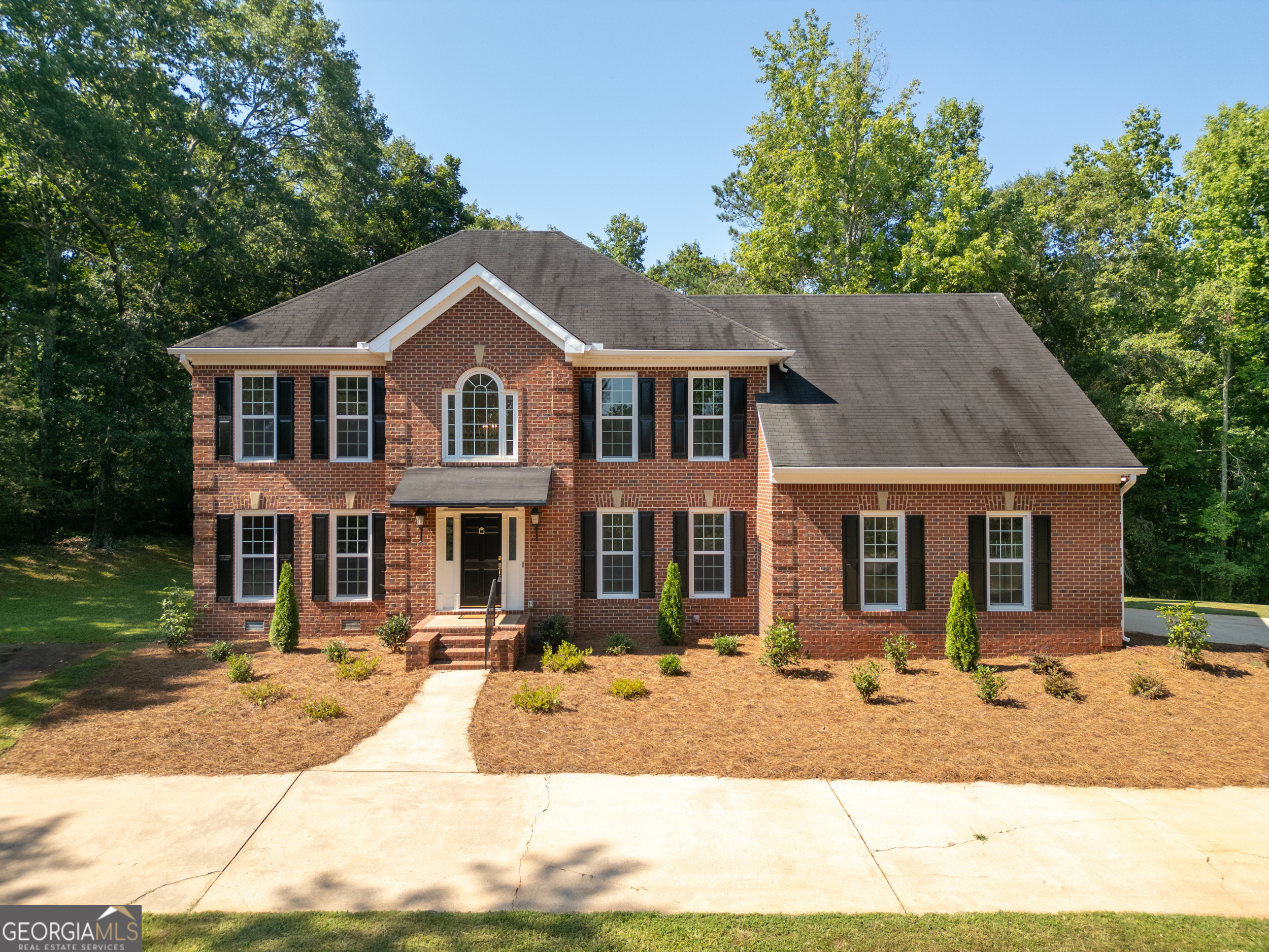NEW LISTING! Introducing an all brick, estate sized home with pond view in Athens, GA! This home features 4 bedrooms and 3 full bathrooms. As you enter into the 2 story grand foyer, all the formal appointments are shown immediately in this home! From the formal dining room, cozy den, custom wood cabinetry in the kitchen, and grand living room with wood coffered ceiling and built ins at the back of the home, each room is spacious enough to entertain and host a variety of gatherings. The bathrooms have been completely renovated by the current owner so all the hard work is already done! All new interior paint as well. There is a bedroom on the main level which is perfect for a guest suite or home office. The kitchen has a built in microwave/wall oven combo as well as an electric cooktop perfect for whipping up an array of gourmet meals. Upstairs, you'll find two additional bedrooms that share a full bathroom as well as a gigantic master suite!! This master features vaulted ceilings with an extremely large bathroom! Plenty of space, double vanities, soaking tub, tiled shower and natural light are all included in the master bathroom. On the exterior, a brand new rear covered deck was installed on the back of the home! Tucked away down a long driveway from the main road, this all brick beauty creates a private oasis perfect for relaxing or having plenty of family and friends over for entertaining!