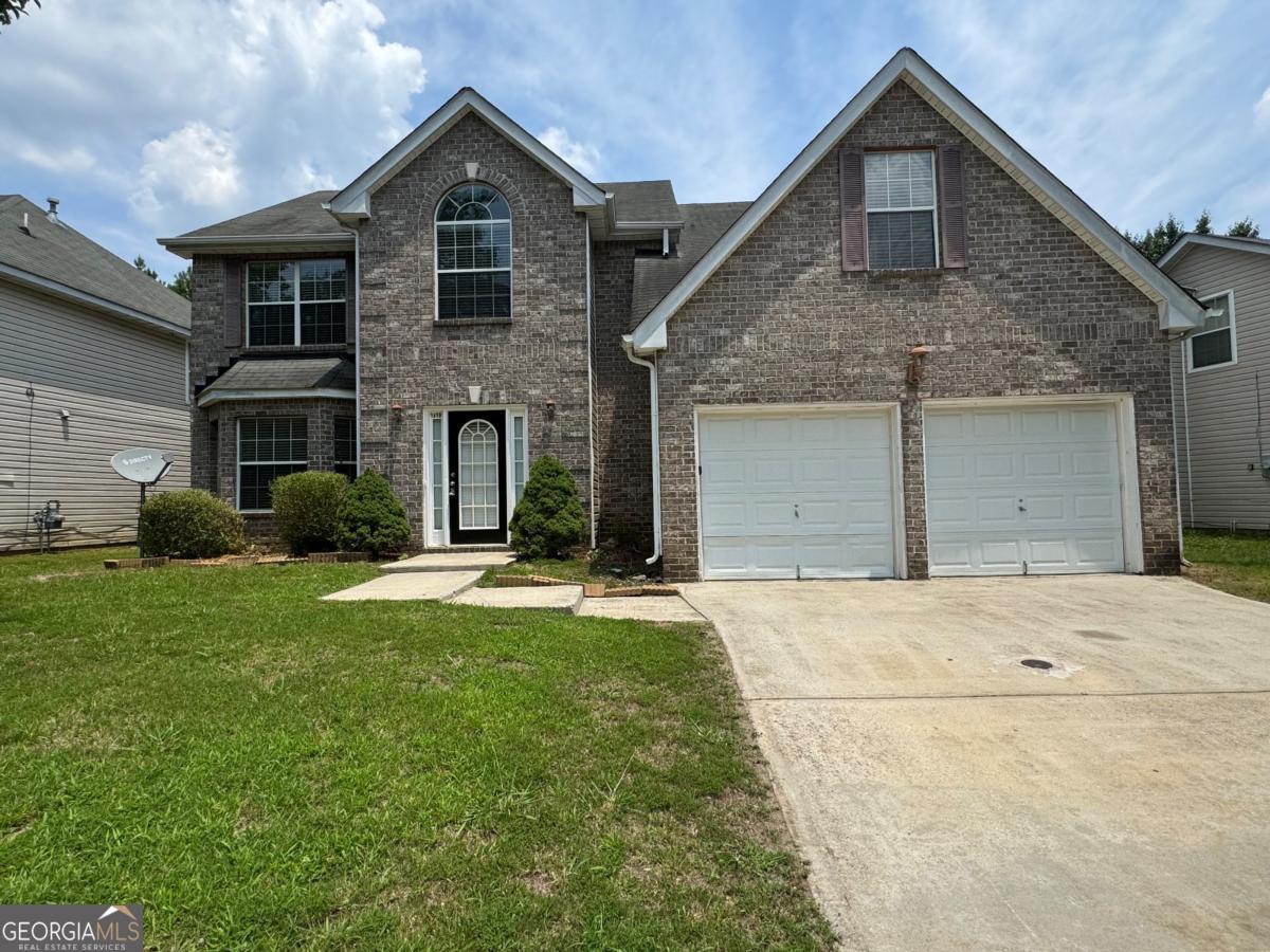 Make a great deal even better with Massive savings through special loan programs with the Preferred Lender Envoy Mortgage with Aubrey Wilcox! Ask the Listing Team for the introduction for up to 100% Financing or even interest rates in the 4s! Welcome to your new home in tranquil Ellenwood! This spacious brick-front residence offers 4 bedrooms, 2.5 baths, and an inviting floor plan ideal for everyday living and entertaining. Enjoy an oversized kitchen, a cozy fireplace in the living room, and a master suite complete with a soaking tub and separate shower. The backyard is perfect for cookouts and outdoor fun. Ellenwood provides a quiet suburban atmosphere with easy access to I-675 and I-285. Nature lovers will appreciate the nearby Panola Mountain State Park and Arabia Mountain trails, while still being within reach of downtown Atlanta amenities.