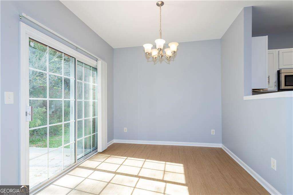 Photo of 995 Treymont Way, Lawrenceville, GA 30045 (MLS # 10689843)