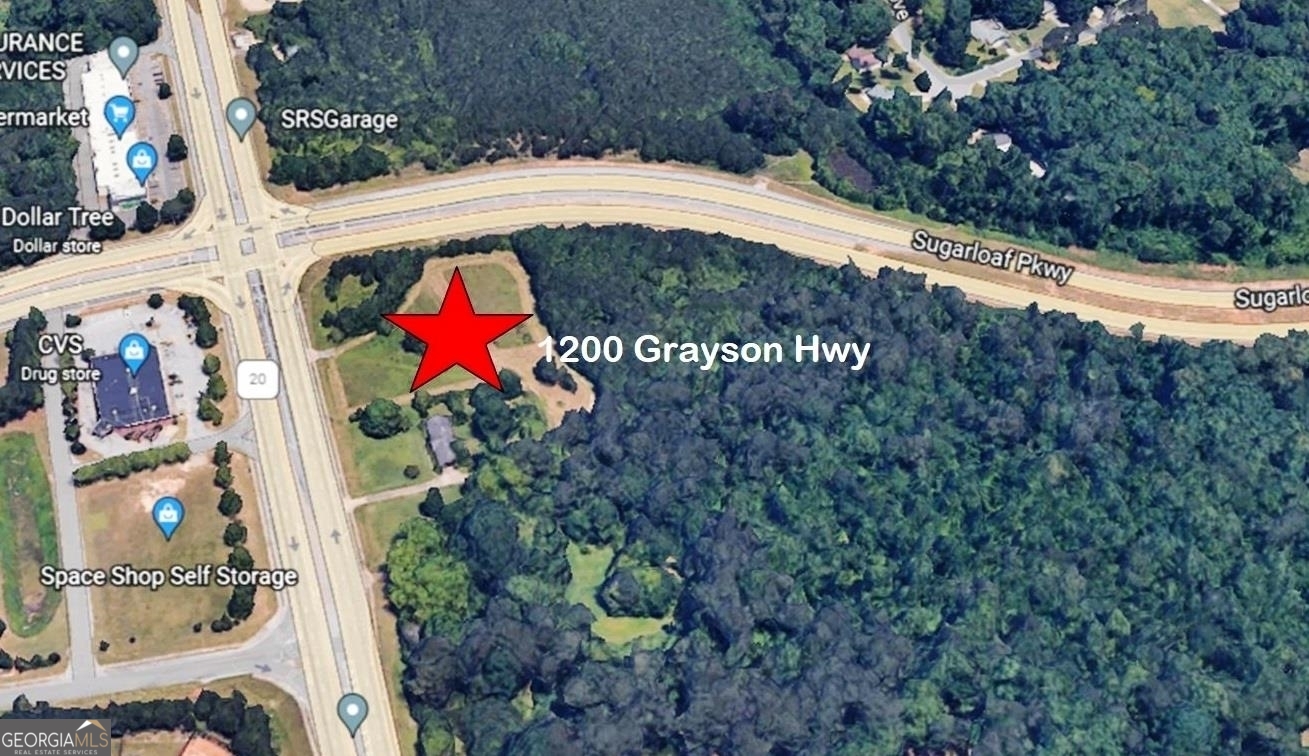 Potential Commercial Property located at the SE Corner of Grayson Hwy(GA 20) and Sugarloaf Parkway. This property consist of 1200 Grayson Hwy and part of 1144 Grayson Hwy totaling Approximately 5+- Acres.