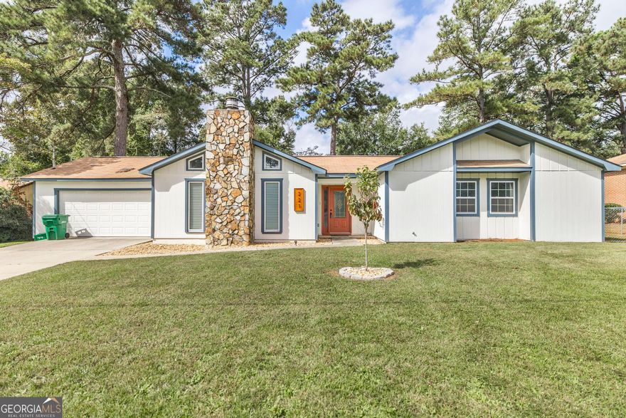 This beautifully updated home offers the perfect combination of modern style and functional living space.  Featuring three spacious bedrooms, including a master suite with a walk-in closet, bath with a large walk-in shower, office, and a bonus space that is perfect for a gym, cozy sitting area, or nursery.  Updated kitchen is bright and airy, stainless steel appliances, granite countertops, & pantry.  Tile flooring throughout, updated baths, tankless hot water heater, and huge formal dining room. Enjoy a quiet evening in the great room in front of the wood-burning fireplace.  Huge yard great for entertaining, wired workshop ideal for DYI projects or extra storage.  Because of the amazing floor plan, stylish finishes, and flexible spaces, this home is a must-see.  Schedule a showing today and make this dream home yours!