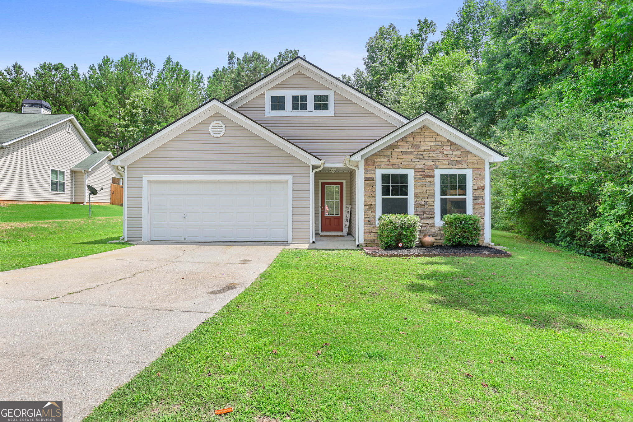 Wonderful, Move-in ready 3 bedroom, 2 bath home located only 1 mile from Hwy 85 Exit. Entry foyer opens to great room with fireplace. Owner suite features a large walk-in closet, a Nice sitting area & a large vanity & soaker tub. Split floor plan. Separate laundry room. Updated kitchen with granite countertops & lots of cabinet space. An eat-in kitchen with a separate dining room could be used as an office or bonus room. Luxury plank flooring in all areas. Patio overlooks level backyard with private wooded setting, fenced-in backyard.. Two-car garage. New Roof in 2024. Located in a USDA-eligible area for 100% financing. Come see this MOVE-IN READY home today!