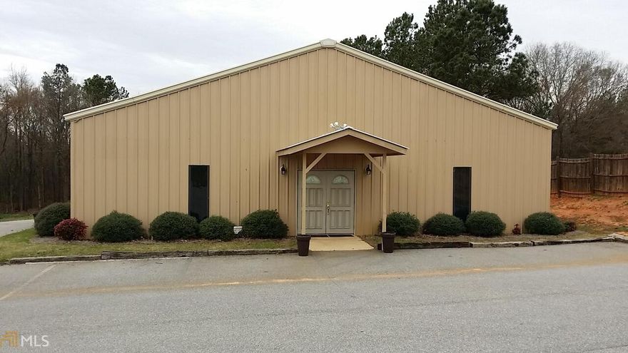 This is a fantastic opportunity for a growing Church to own a highly visible property with a newly renovated facility in excellent condition. Other possibilities include potential for commercial office use or several other potential commercial uses - all subject to county approval. Property includes road frontage with high visibility and excellent signage potential. An asphalt paved parking lot serves both the front & rear of the building. Approximately 30 parking spaces with plenty of room for expansion. Deep lot for potential storing of heavy equipment, trucks, etc well off the main road. There is a picnic shelter situated at the rear of the parking lot behind the building. The newly renovated metal building consists of approx. 4400 square feet of building