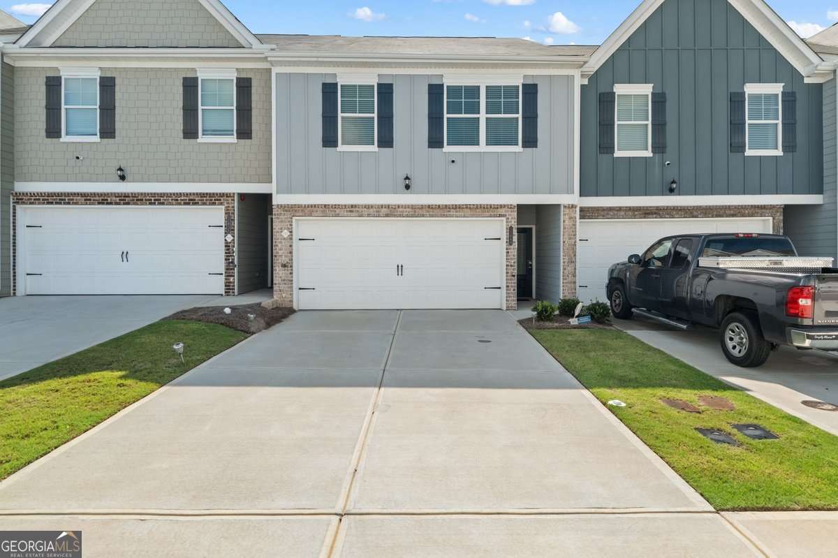 This nearly new 2-story townhome is ready for a new occupant. Main level includes wide plank hardwood floors, a spacious family room with a cozy fireplace. Chef ready kitchen with gray cabinets, granite countertops, large island stainless appliances and guest bath. The upper level features a huge primary suite with dual vanity bath and large standing shower and a generous walk-in closet. Two additional well-sized bedrooms with adjoining full hall bath and granite vanity. The property is available for 100% financing with approved credit.