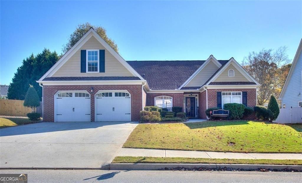 Welcome to this exceptional move-in ready ranch-style home that seamlessly combines modern updates with timeless appeal! Recent improvements include a new HVAC system, hot water heater, roof, and irrigation system. Additional new enhancements include a renovated kitchen with new stainless appliances, refurbished cabinets & new tile backsplash, wide plank flooring, fresh designer paint, door & plumbing hardware, contemporary lighting, refreshed bathrooms and more! This Home is sure to captivate your heart!. Upon entry, you'll notice the welcoming ambiance and well-considered floor plan. The spacious living area with cozy fireplace presents an ideal space for gathering and relaxation, while the adjacent eat-in kitchen boasts ample cabinetry and elegant countertops, catering to culinary enthusiasts. This outstanding residence offers a screened porch and a private fenced backyard, providing both comfort and privacy. The primary suite is designed as a retreat, complete with a luxurious ensuite bathroom and generous closet space. Two additional bedrooms offer versatility for family or guests. The finished upstairs loft can serve as a fourth bedroom suite, office, media room, playroom, or gym, adapting effortlessly to your needs. Surrounded by lush landscaping and serene greenery, the outdoor areas provide a tranquil environment for leisure and entertaining. The screened porch is perfect for enjoying morning coffee or hosting gatherings. Conveniently located near Sugarloaf Parkway, Sugarloaf Mills Mall, I-85, and GA-316, this property provides easy access to schools, shopping, dining, and entertainment venues. Seize the opportunity to make this special abode your new home. No rent restrictions. Schedule your Showing today!