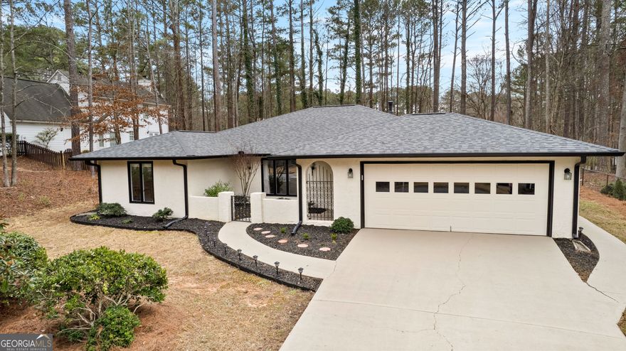Move-In Ready Ranch in the Heart of Peachtree City! Tucked away near Braelinn Golf Club with all its amenities, Luther Glass Park, and over 100 miles of Peachtree City's multi-use paths, this home offers the ideal lifestyle for anyone looking for one-level living in a prime location. When you enter the home you have a large open living area and 3 bedrooms to your left. Both full bathrooms are recently renovated with beautiful new vanities. The kitchen is the heart of the home to the right, open to the keeping room and the built in dining nook. It features stainless steel appliances, including a gas stove, granite counter tops, and a breakfast bar.  The sunroom adds yet another living space, overlooking the generous backyard. Between the new A/C unit and the new roof, you can move in with peace of mind. This charming, updated ranch is the perfect blend of character and convenience! Schedule your showing today and see why the Peachtree City lifestyle doesn't get better than this!