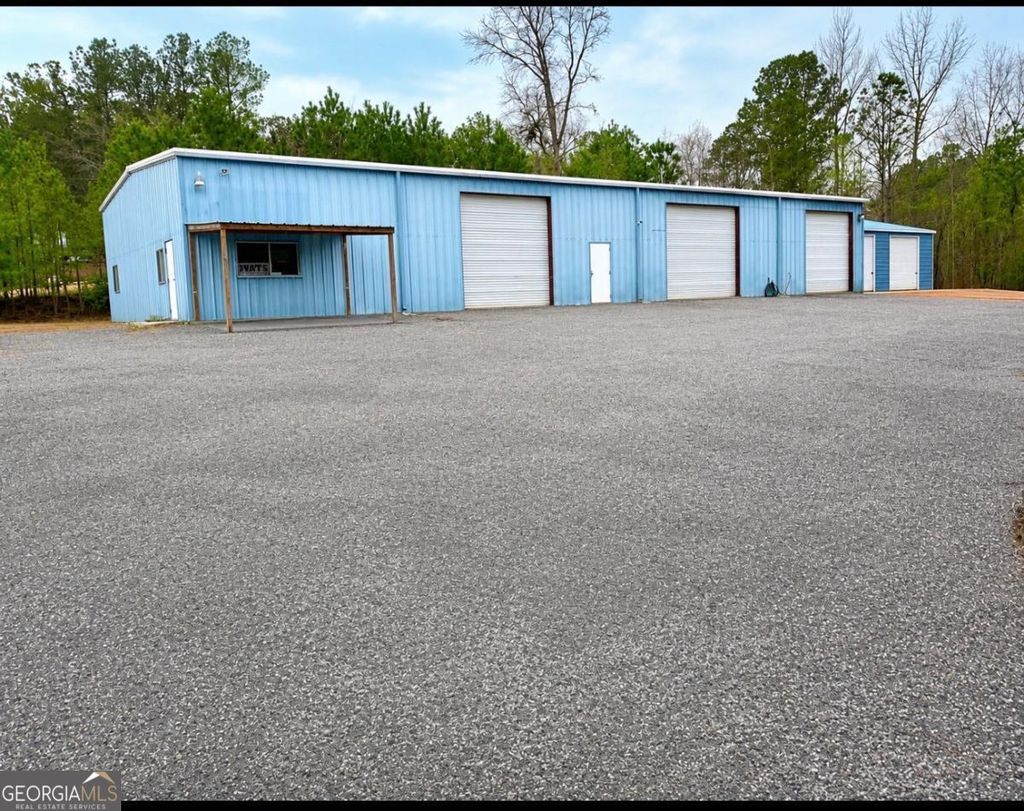 Photo of 1407 Highway 19, Meansville, GA 30256 (MLS # 10809900)