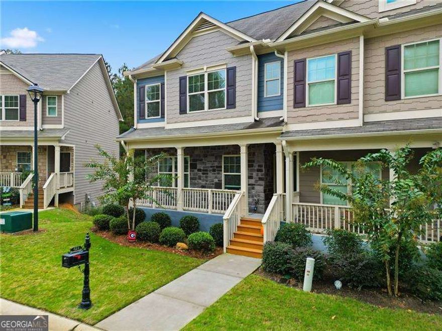Welcome Home! This end-unit can be found just around the corner from Downtown Holly Springs Town Center with easy Peach Pass access off of 575! Enjoy all of the perks of newer construction in this meticulously maintained townhome. Neutral paint colors and faux wood blinds throughout and freshly painted exterior in 2024! Eat-in kitchen with oversized island opens into living room with plenty of natural light and exterior access to back deck overlooking private wooded area. Flex space off of kitchen can be used for dining room or office! Additional bonus room to the left upon main level entry from front porch offers a cozy nook perfect for reading or additional office space. All bedrooms and laundry room can be found upstairs! Primary bedroom boasts of walk-in closet and en-suite bathroom, with secondary bedroom sizes that will not disappoint. 2-car, drive under garage opens into unfinished basement space with sealed floor perfect for additional play space or storage! Don't miss the side yard the end-unit offers and additional parking pads for guests behind the unit!