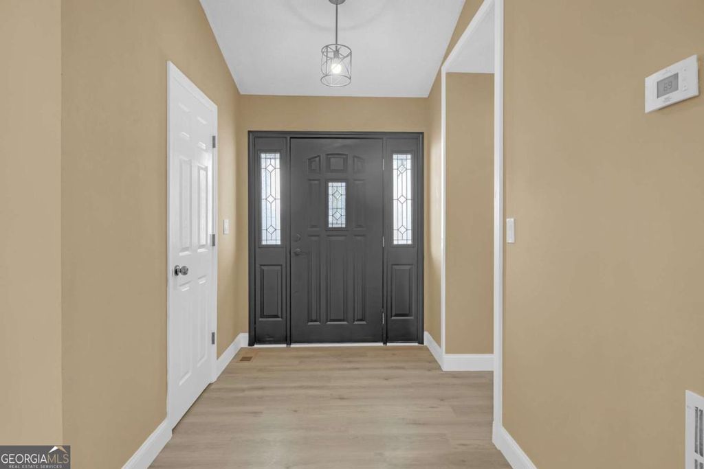 Photo of 7020 Old Bethsaida Way, Riverdale, GA 30296 (MLS # 10656040)