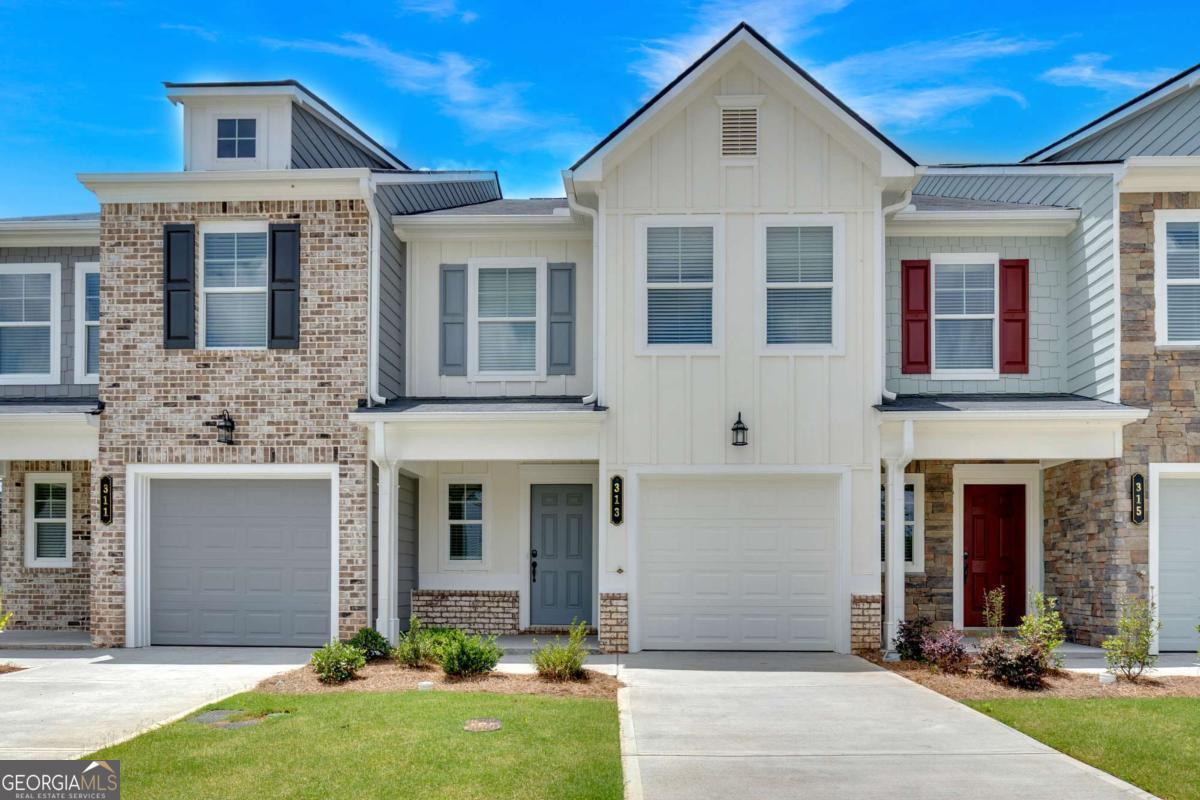 Move-in ready and full of charm, the Crape Myrtle at Village Green is a well-designed 3-bedroom, 2.5-bath new construction townhome. The open-concept main level features LVP flooring, a stylish kitchen with 36 inch Cabinets and Granite Countertops, tile backsplash, and a spacious island with overhang-perfect for entertaining or everyday living. All appliances are included for added convenience. Upstairs, the private primary suite offers a spa-like bathroom with double vanities, Tile Shower and Flooring, and 2 walk-in closets. Located in Adairsville with easy access to I-75, Village Green offers affordable, low-maintenance living with builder warranties and 100% USDA financing options available. Ask about our current Builder Incentive.