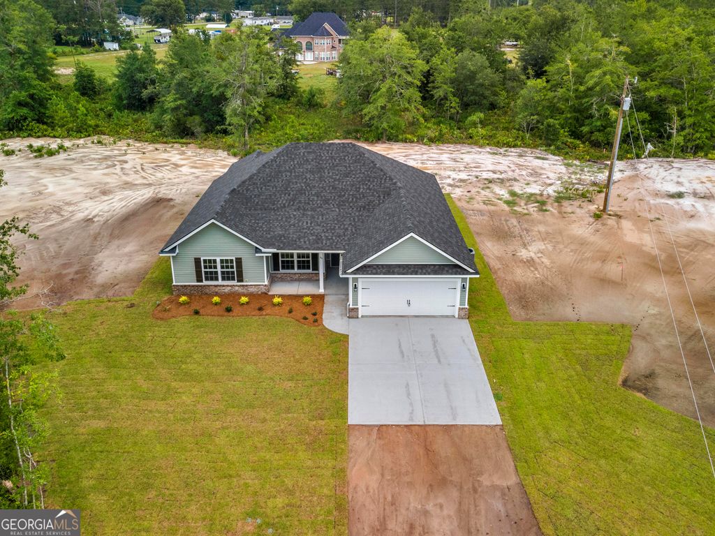 Photo of 143 Millpond Plantation Lane SE, Ludowici, GA 31316 (MLS # 10722533)