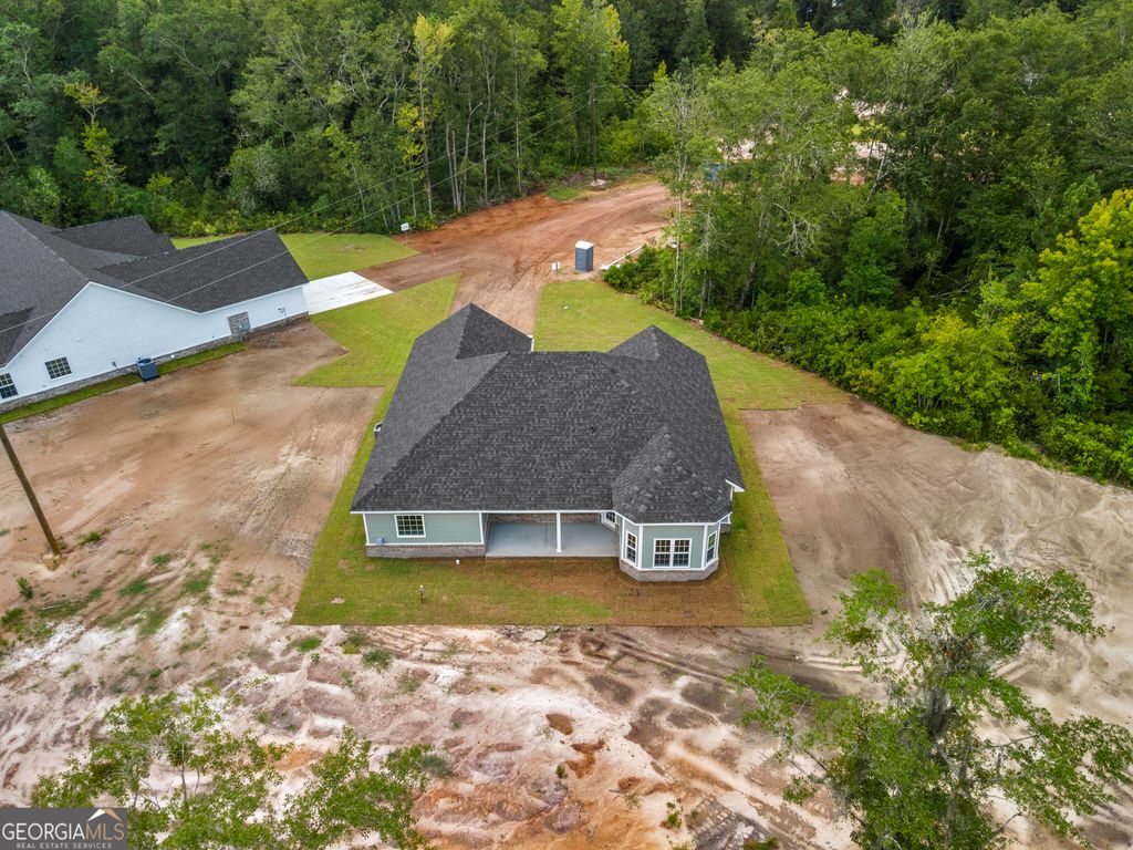 Photo of 143 Millpond Plantation Lane SE, Ludowici, GA 31316 (MLS # 10722533)