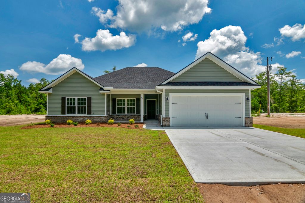 Photo of 143 Millpond Plantation Lane SE, Ludowici, GA 31316 (MLS # 10722533)