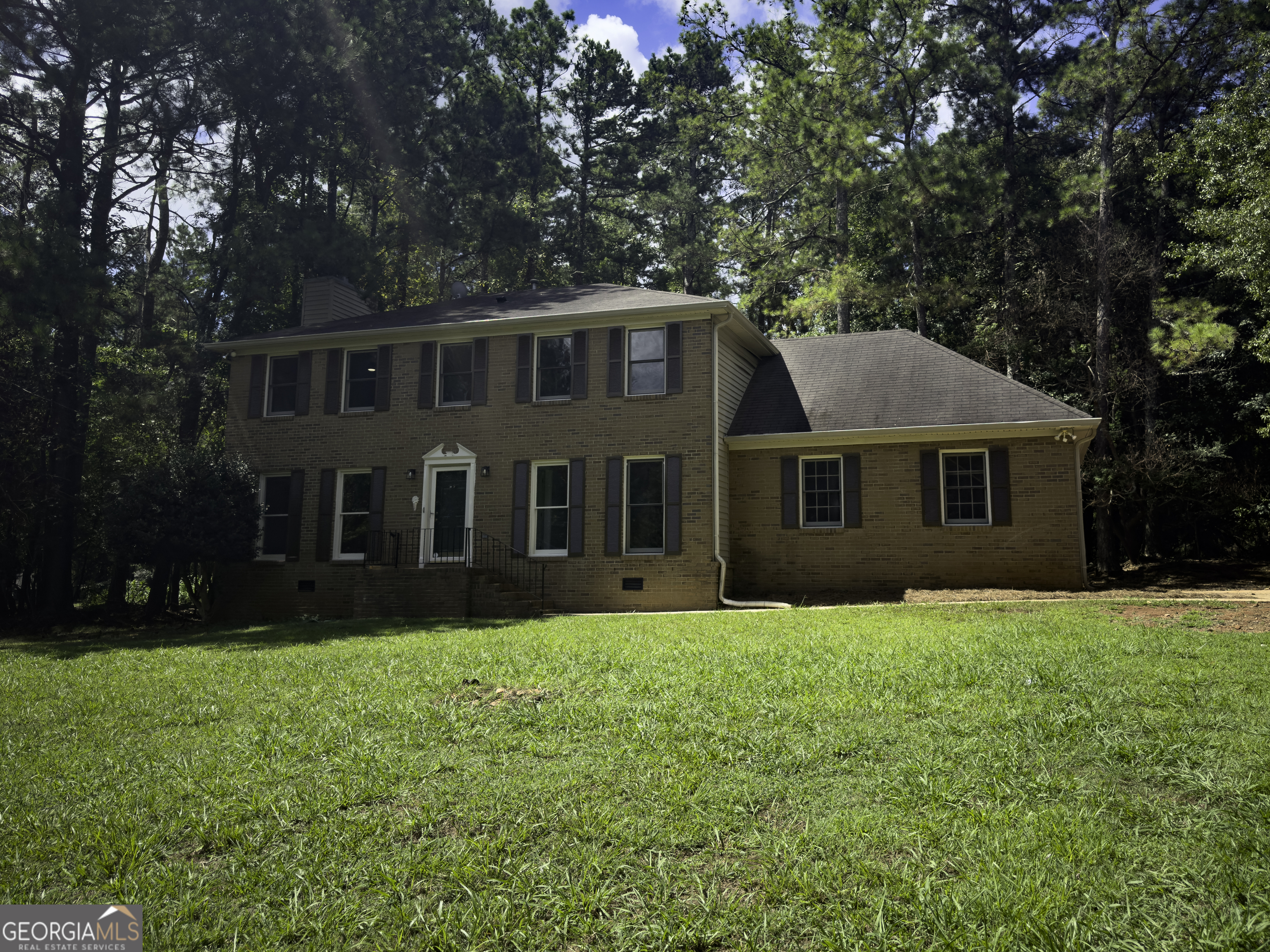 Welcome to your dream home in the highly sought-after Whitewater School District of Fayette County! Nestled in a quiet cul-de-sac, this beauty boasts a fully renovated interior featuring brand-new luxury vinyl plank flooring, fresh paint throughout, and completely updated kitchen and bathrooms-no detail was overlooked. Upstairs, you'll find the spacious primary suite featuring a walk-in closet and a luxurious en-suite bathroom with double vanities, a soaking tub, and a separate shower. Two additional bedrooms, a full bathroom, and a versatile bonus room complete the upper level. The main floor includes a cozy family room, a formal dining room, a kitchen with a sunny breakfast area and recess lighting throughout, and a convenient half bath-perfect for entertaining or everyday living. But that's not all-step out onto the back deck and discover a private, loft-style in-law suite complete with its own full bathroom, walk-in closet, sleeping/living area, and a kitchenette. Ideal for guests, extended family, or even rental income potential. Additional upgrades include two new garage doors, two brand-new HVAC units and new ductwork for efficient, year-round comfort. Don't wait-schedule your private tour today and make this move-in-ready beauty yours!
