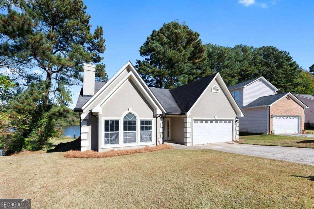 Photo of 7056 Shore Road, Lithonia, GA 30058 (MLS # 10631281)