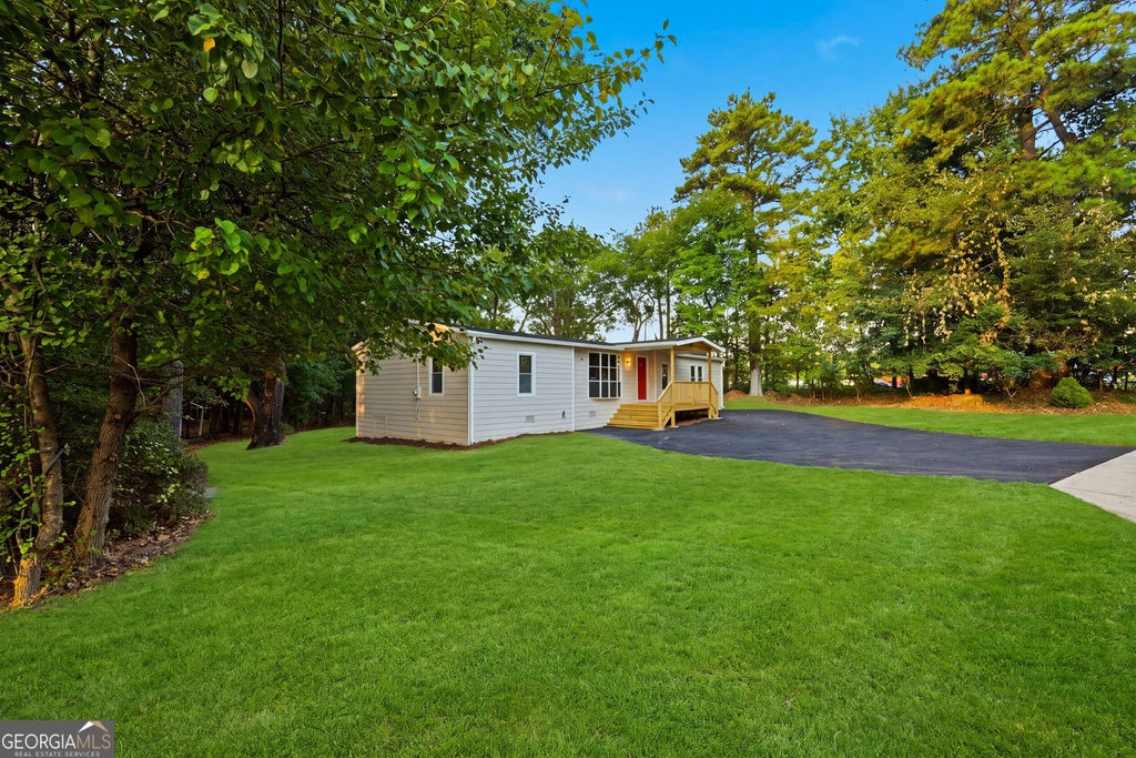 Photo of 1077 New Hope Road, Lawrenceville, GA 30045 (MLS # 10834571)