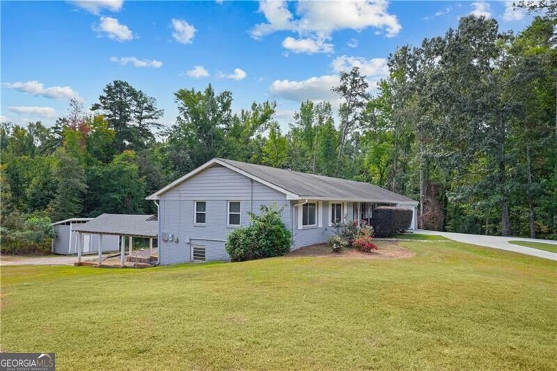 Photo of 1440 Kennesaw Due West Road NW, Kennesaw, GA 30152 (MLS # 10870116)