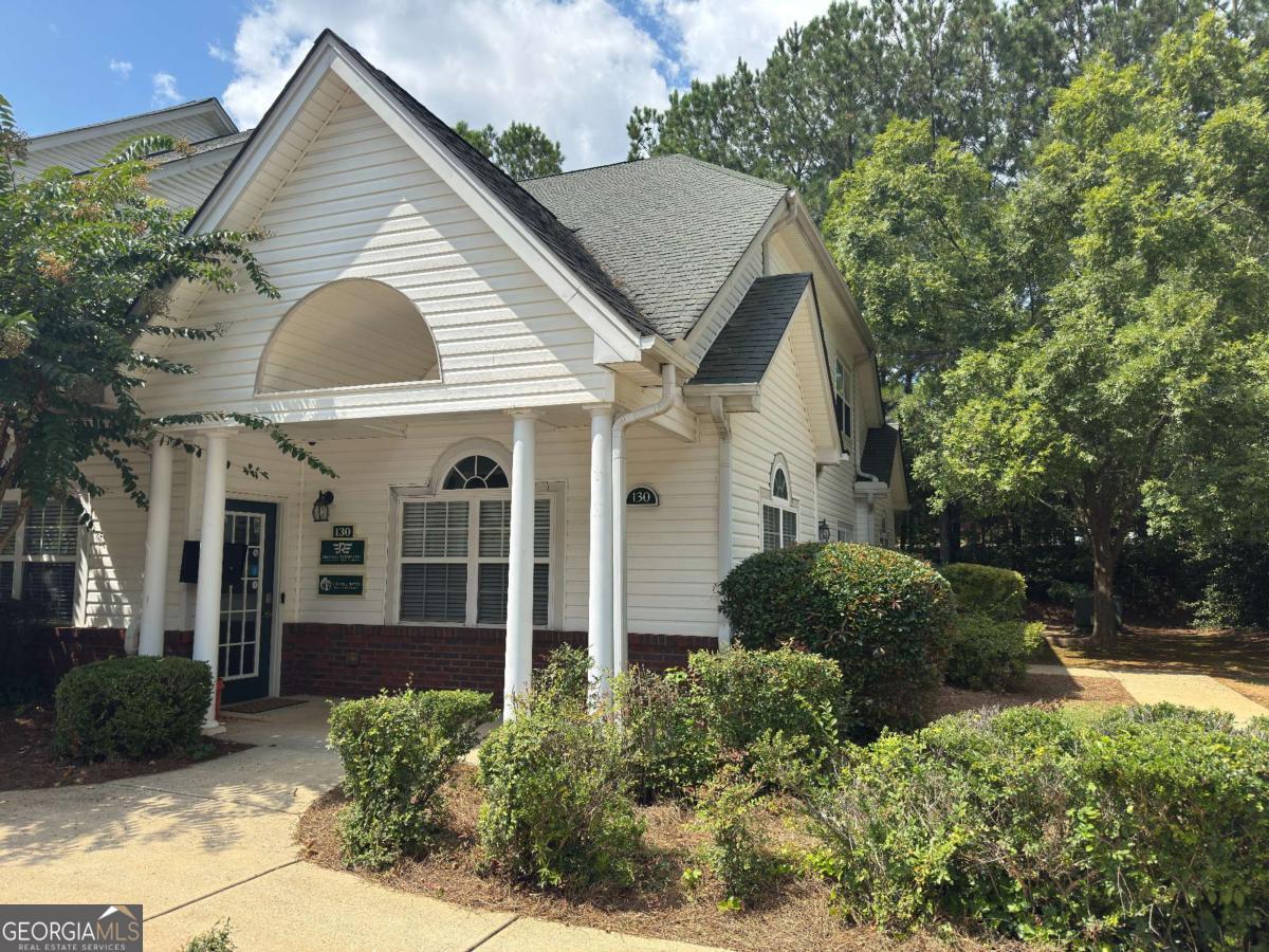 An Exceptional Opportunity for Growth in Cobb County. Built in 2000, and conveniently located on Piedmont Road in East Cobb, this updated office condo is ideally situated in a quiet professional office park. There is a new high efficiency HVAC system installed in 2021 along with upgraded interior finishes and fresh paint. There is an abundance of natural light throughout. A welcoming reception area immediately sets the tone, and French Doors open into a spacious and light-filled conference room, complete with built-in shelves. There are four offices on the first floor that are big enough for co-working shared space. You'll find an executive office and expansive co-working areas on the second floor with lots of natural light. This level also includes a second bathroom, uniquely equipped with a built-in shower. There is attic access for additional storage too. This is more than just an office; it's an opportunity to build equity in an asset and say goodbye to rent and unpredictable increases. The office park provides plenty of parking for both employees and clients. Furthermore, the low taxes contribute to a lower overall cost of ownership.
