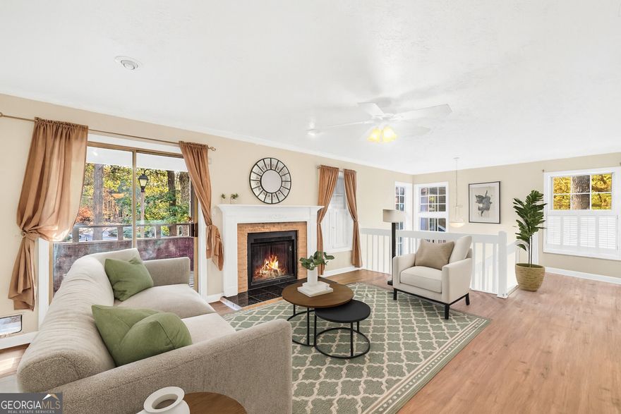 Motivated seller!! Welcome to this move-in ready 2-bedroom, 1-bathroom upstairs end unit condo, offering a perfect blend of modern upgrades and convenient living. The open-concept living area is bright and airy, featuring brand-new floors and a cozy fireplace, ideal for relaxing or entertaining. The kitchen is a standout with  tile backsplash, granite countertops, ample counter space, a pantry, and plenty of storage. A sliding glass door leads to a private balcony with a storage area.  The spacious master bedroom boasts a picture window, adding a touch of elegance, and offers a large closet to meet all your storage needs. The second bedroom is spacious, perfect for guests or a home office. The bathroom is tile, and quite roomy.  Located less than a mile from the brand-new, state-of-the-art children's hospital and close to shopping, dining, and local amenities, this condo offers both comfort and convenience. The community features a pool and tennis courts, making it easy to relax and stay active. Plus, with window treatments throughout, all the details are taken care of for you to move right in and make this home yours. Motivated seller!