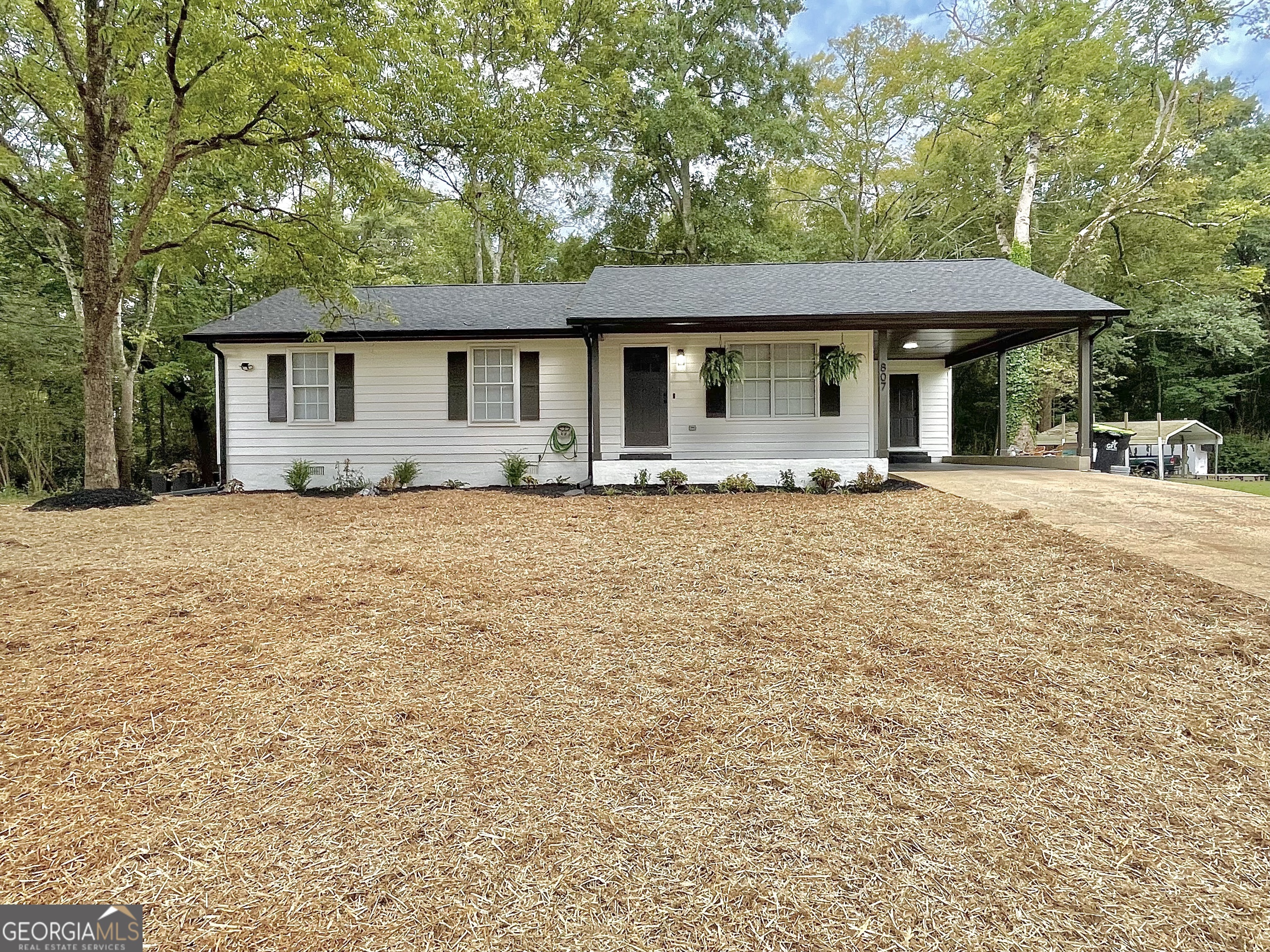 Like-New & Move-In Ready! This beautifully renovated 4-bedroom, 2-bath home in the heart of Rockmart has been thoughtfully updated from top to bottom. Step inside to discover fresh interior & exterior paint, brand-new flooring, stylish light fixtures, and a modern open kitchen featuring quartz countertops, new cabinetry, and stainless steel appliances. Both baths have been completely refreshed with sleek finishes and new plumbing fixtures. Major improvements include a new roof, gutters, and HVAC system-ensuring comfort and peace of mind for years to come. Outside, enjoy a charming setting just minutes from shopping, dining, and everyday conveniences-all less than 10 minutes away.